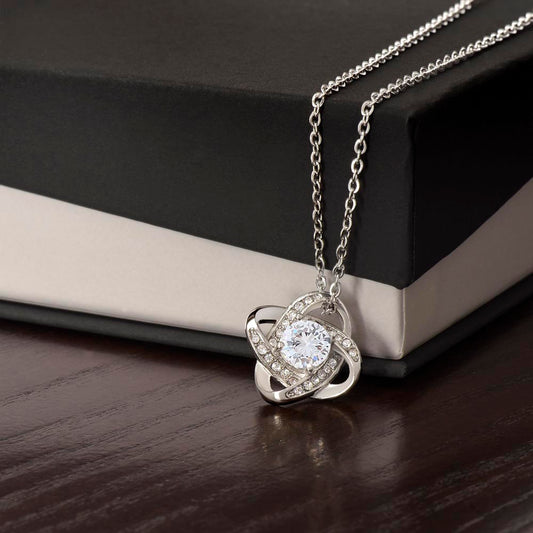 Soulful Connection: Love Knot Necklace with CZ Crystals - White Gold or Yellow Gold Finish